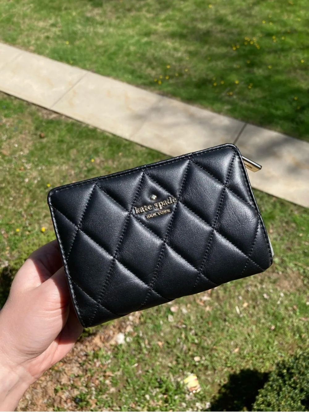 Kate Spade New York Carey Medium Compact Bifold Wallet in Black Quilted Leather